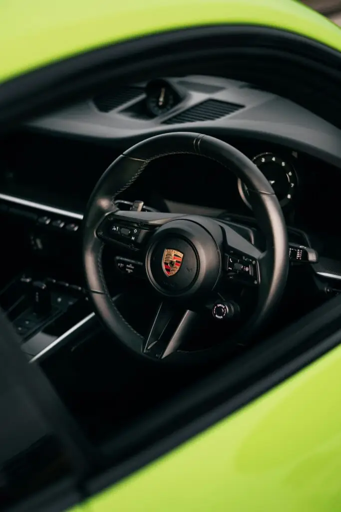 Leather steering wheel and instruments in a Porsche interior